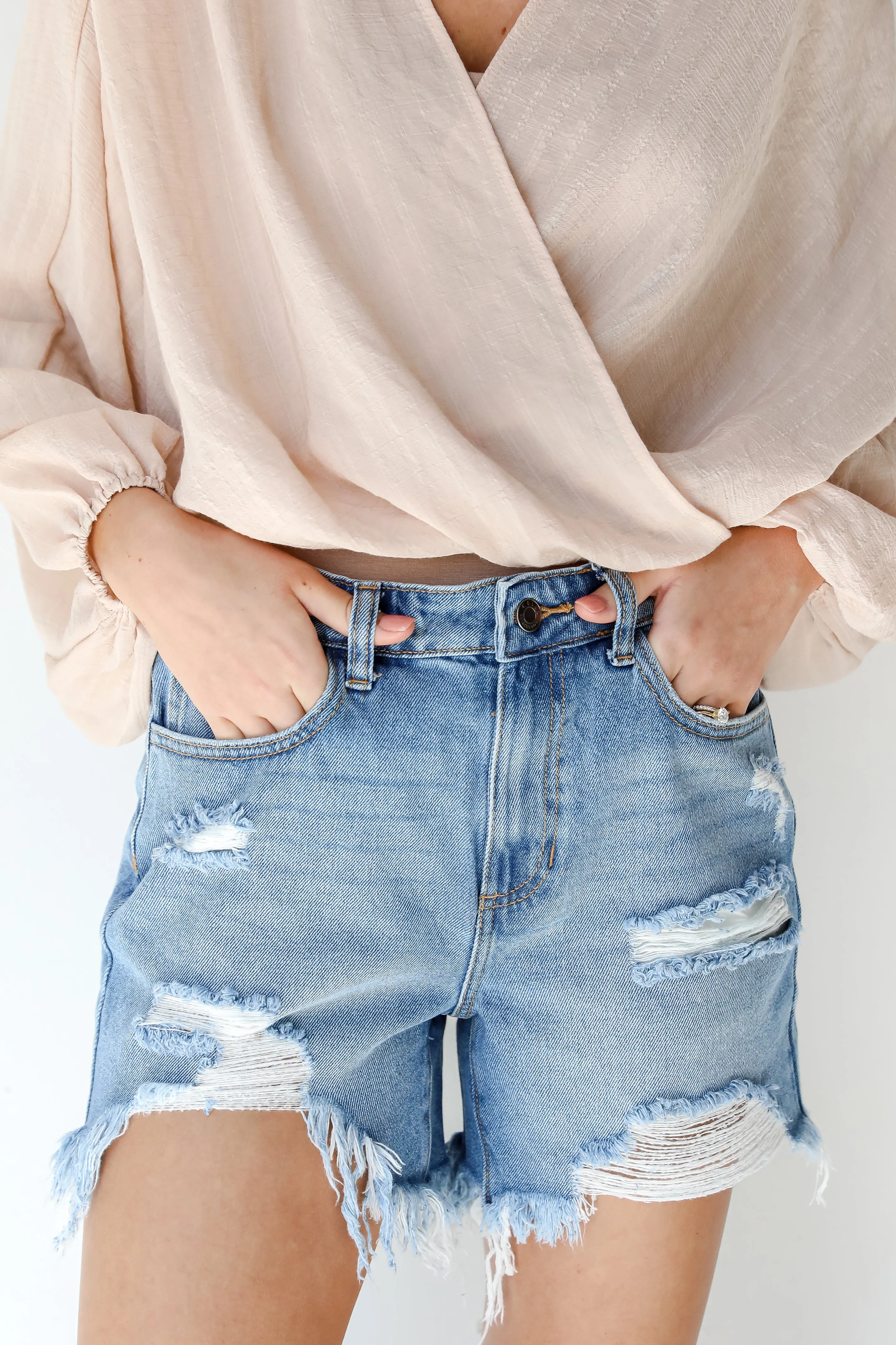 Bottom Line Distressed Denim Shorts