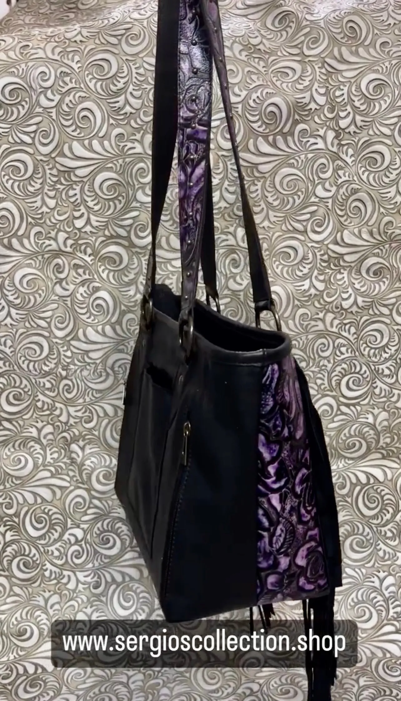 Large tote with authentic designers canvas and embossed leathers